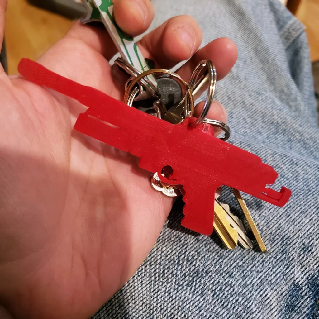 Red Autococker Paintball Marker Key Chain on keys 